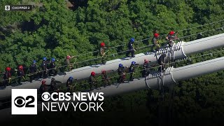 Local, federal employees scale George Washington Bridge for training exercise