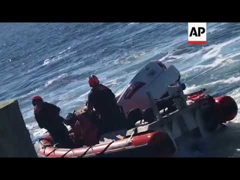 US Coast Guard rescues man from sinking car - YouTube