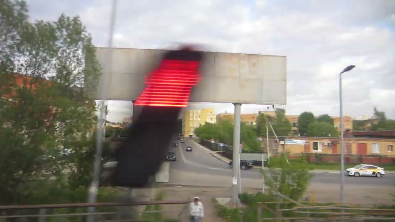 Город Дмитров из окна электрички