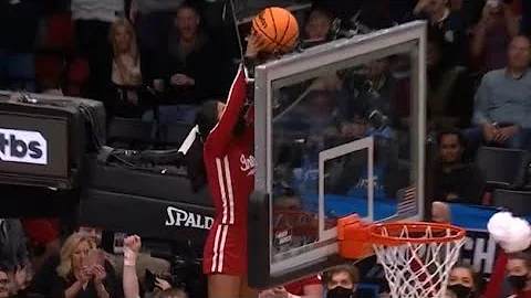 Cheerleader Gets Ball Unstuck Behind Backboard / NCAA March Madness