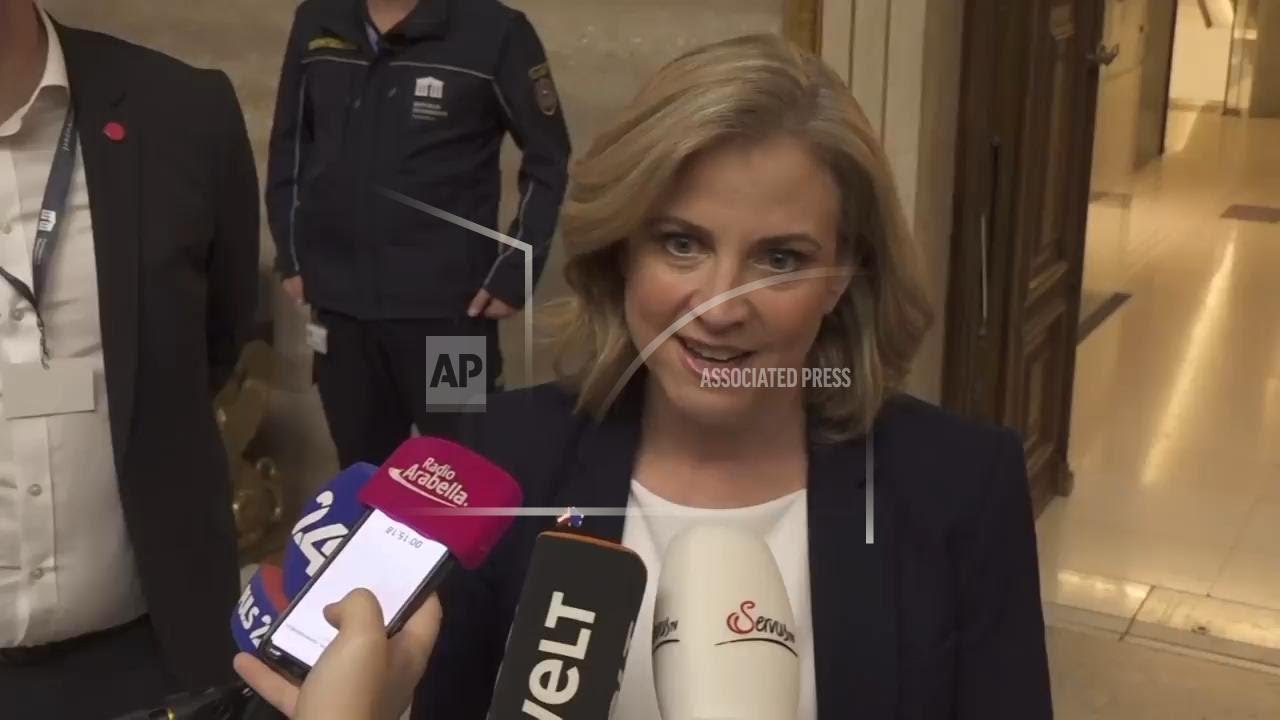 Austrian NEOS party leader is celebratory after election predictions announced