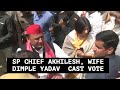 SP Chief Akhilesh Yadav, Dimple Yadav leave from a polling station in Saifai, UP