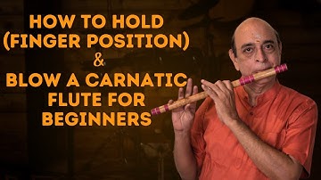 Learn how to hold & blow a Carnatic flute.