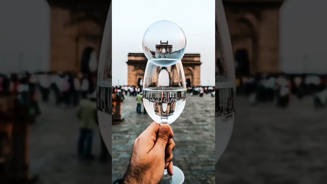 Trying lensball with wine glass at Gateway of India! 