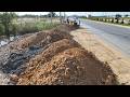 Great job! Heavy equipment in motion—Komatsu dozer and dump trucks working together smoothly