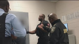 Secretly recorded video shows former Clayton Co. Sheriff order handcuffed man into restraint chair