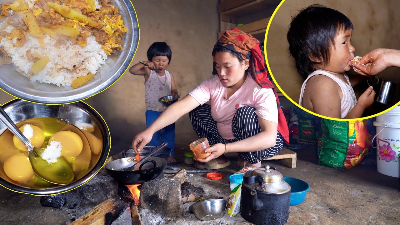 Rural mom Cooking & feeding her little Son II Jonson having egg ...