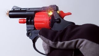 Toy Cap GUN revolver firing in macro SLOW MO by SLOWMOER - Slow Motion Videos 2,898 views 5 years ago 2 minutes, 3 seconds