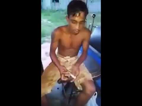 Sri Lankan man eating fish fresh