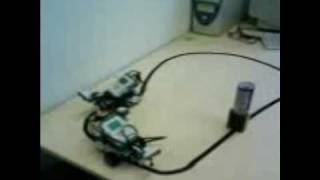 2 basic Lego Mindstorms NXT robots following a track and communicating via bluetooth