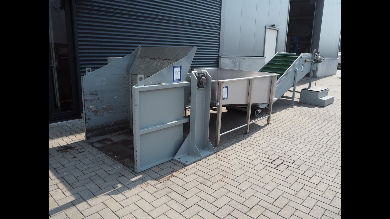 618-506: Schouten B.V. tilting device with infeed bunker and elevating belt