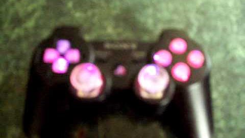 Black Dualshock 3 with clear buttons with Rainbow slow flash leds