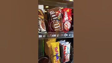 Buying Colorful M&M’S Chocolate Candy from the Vending Machine #shorts #trending #viral #asmr