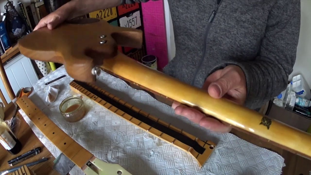 Refinishing a fretboard using water-based Min Wax wipe on poly
