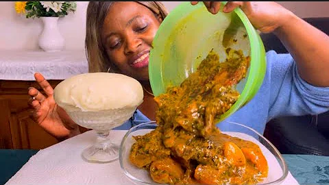 African food smoked fish +cow skin ogbono soup mixed with bitter leaf and Fufu eating show notalking