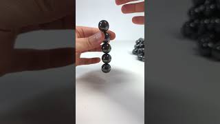 Magnetic Balls in Slow Motion