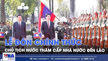 Trang trọng Lễ đón chính thức Chủ tịch nước Lương Cường thăm cấp Nhà nước đến Lào - VNA