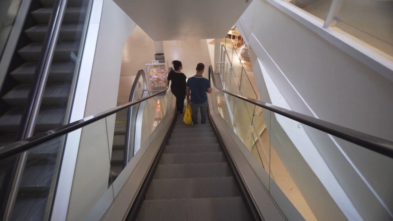 Sweden, Stockholm, IKEA Kungens kurva, 3X escalator, going down from restaurant to street level