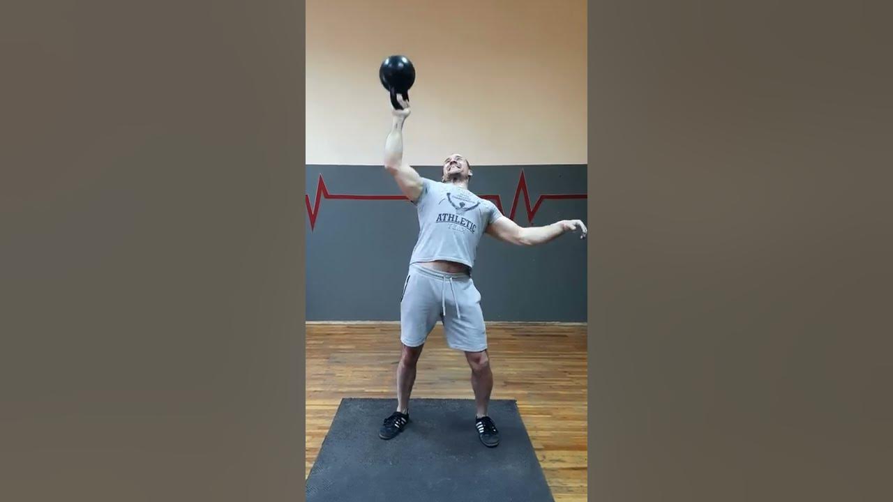 Толчок гантелей стоя