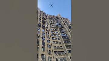 New Skill in High-altitude Operations: Drone Precisely Hoists Large Items for High-rise Buildings