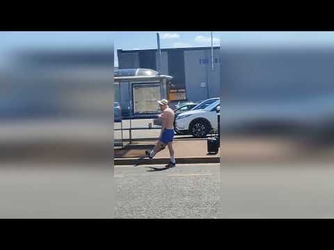 Hilarious video shows topless Scots man pulling bizarre bus stop dance moves in solo street rave
