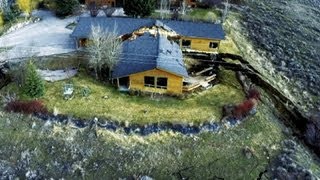Wyoming landslide splits home in two, creeps towards resort town