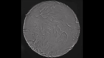 Mechanism of large-scale flow reversals in turbulent thermal convection