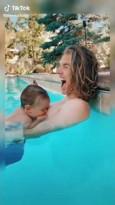 The baby want Milk from Father boobs🤣🤣🤣