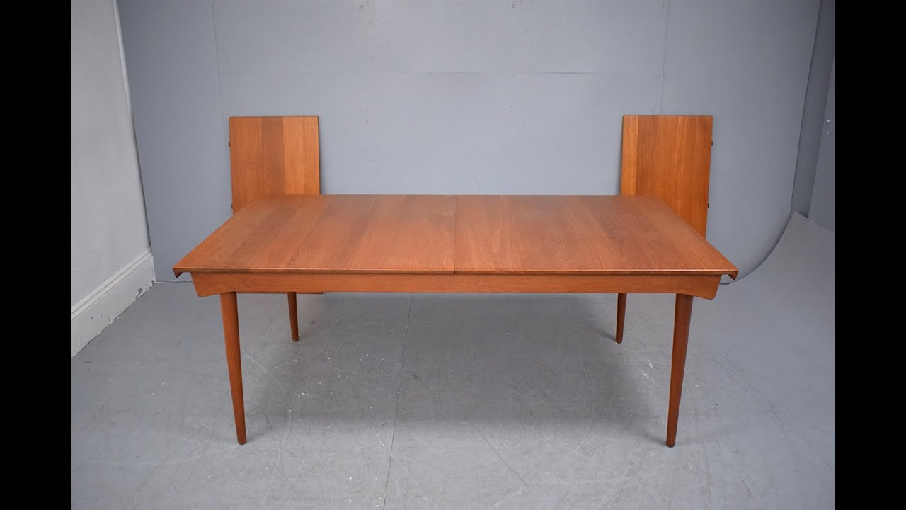 Finn Juhl design extending dining table in solid teak model FD540
