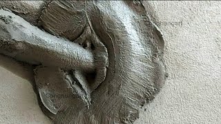 A hibiscus flower handmade from cement is very cool