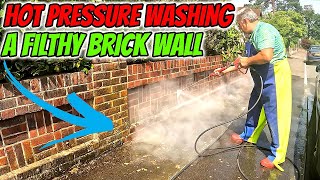 Hot power washing another brick in the wall