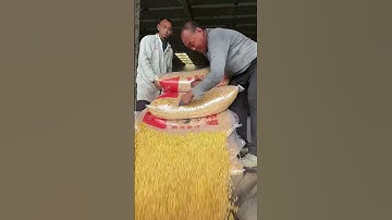 The process of unpacking corn kernels- Good tools and machinery make work easy