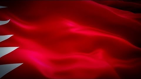Qatar flag video waving in wind. Realistic Doha Flag background. Qatar flag Full HD