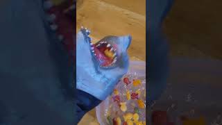 Hungry Hand eats Rainbow Goldfish!