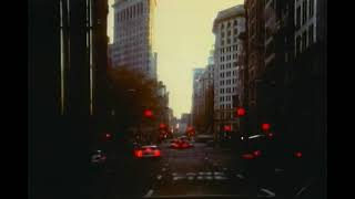 New York, USA 1999 The Flat Iron at dusk from a bus on 5th Avenue.