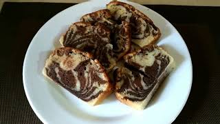Hi everyone today i am going to teach you my favorite zebra cake
without oven.choco vanilla is very easy and yummilicious, hope like
it.plz sh...