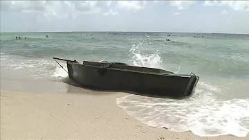 Cuban migrants ask beachgoers if they’ve made it to Miami