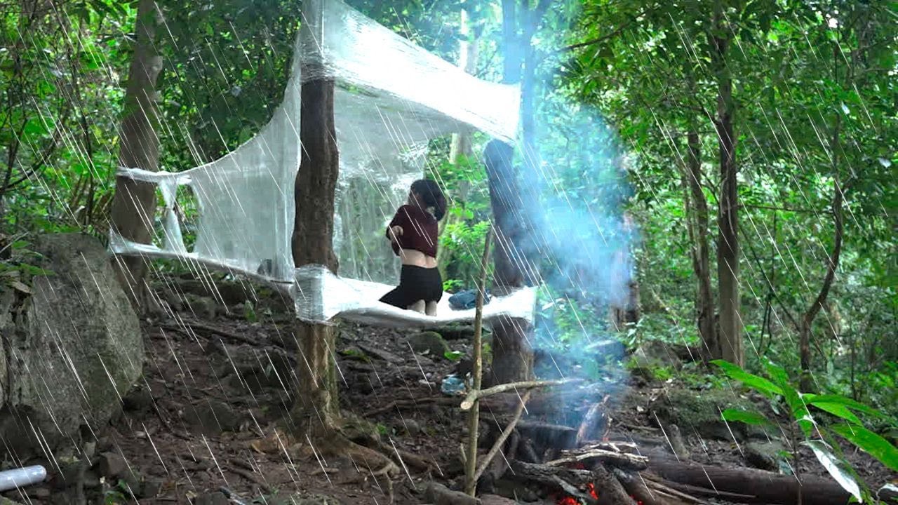 Using Plastic Wrap as an Improvised Shelter to Stay Dry During Heavy Rain