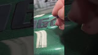 Painting faux badges #pinstriper #signpainting