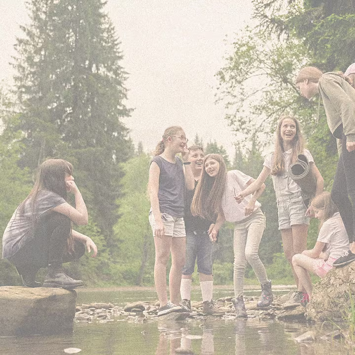 Kids playing in stream
