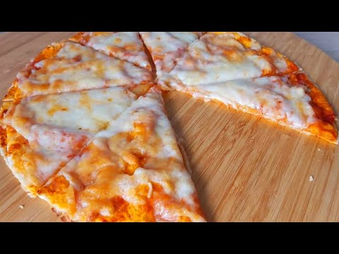 Video: Hoe Om Pizza Te Maak Met Tamatie En Mozzarella