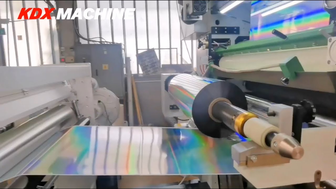 Holographic film lamination by KDX laminating machine. #laminator Italian hot knife selefon makinesi