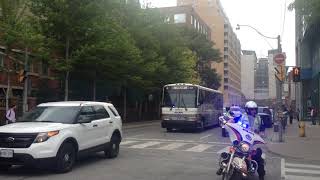 Toronto Police Motorcade crosses through downtown Toronto during special conference.