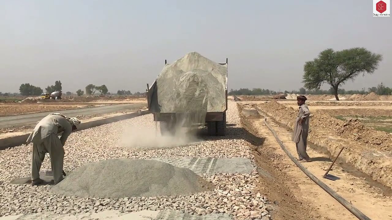 Stone Dust Laying Process on WBM & Compaction. Construction of Road