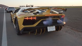 Gintani Lamborghini Aventador SVJ vs Gintani Ferrari F12. HEADPHONE USERS BEWARE!!!!