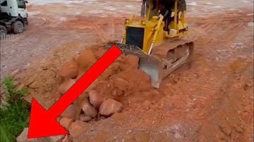 Strong Engine Bulldozer Working Komatsu D65E, D61EX Pushing Rocks Leveling Land