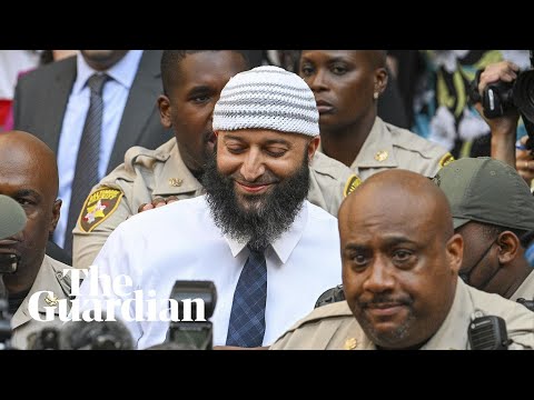 Adnan Syed, subject of the Serial podcast, exits court to cheers