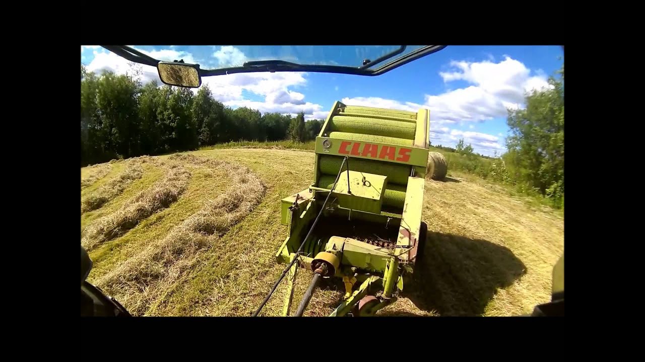 Säilöheinän paalausta pyöröpaalaimella. Baling hay with Claas Rollant 62