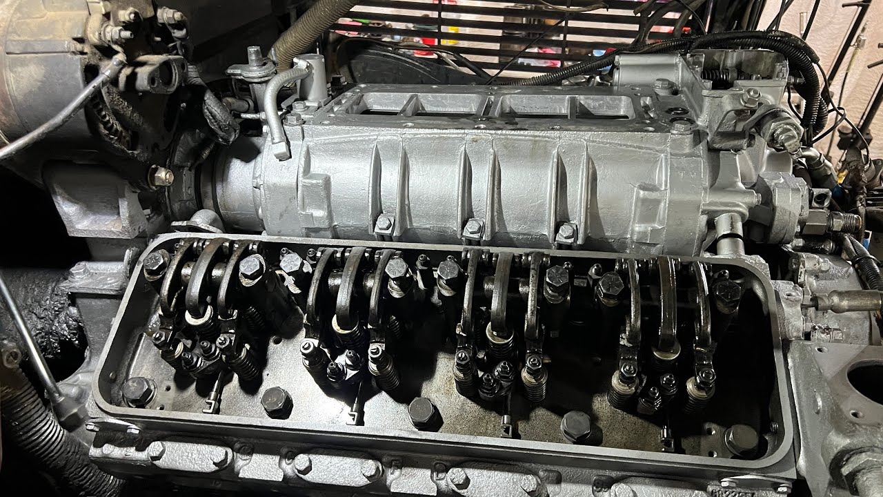Detroit diesel 8v92TA rebuild. Water pump rebuild, heads going on, main ...