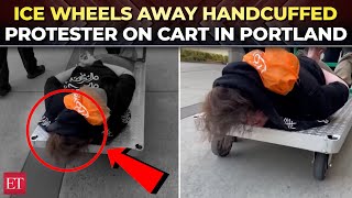 ICE takes away handcuffed Portland protester on a cart, video goes viral | US Immigration Crackdown